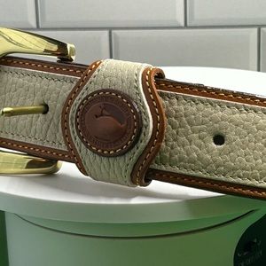 Dooney Bourke  beige genuine leather 90012 belt. Medium 30-32 used.